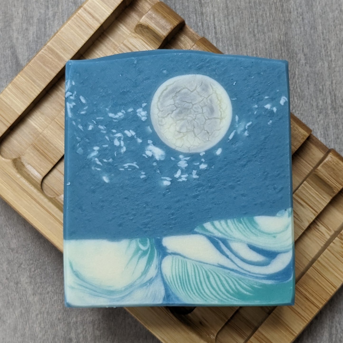 Soap with moon ans and water design on soap dish