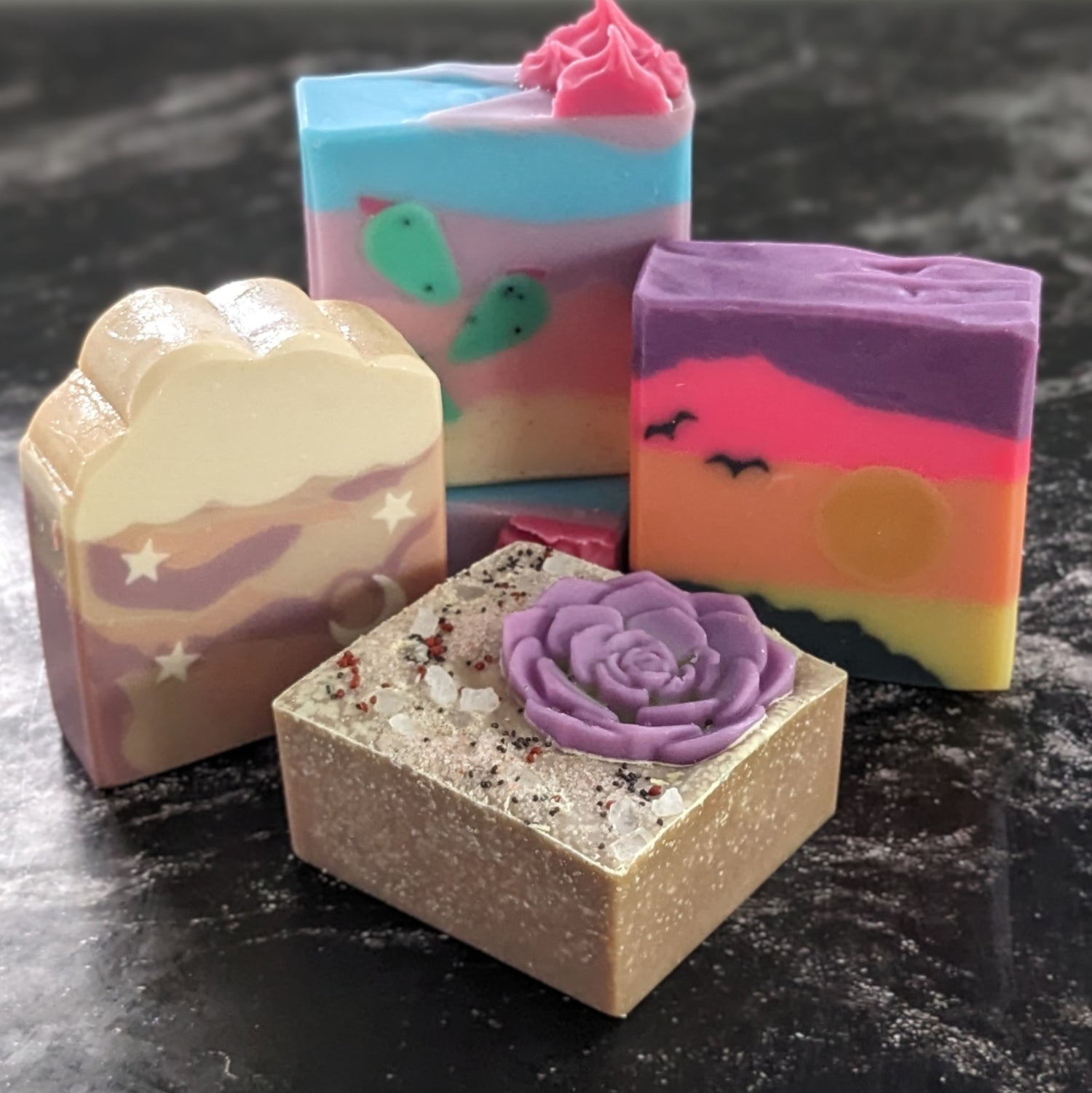 Four soaps standing up in the Deserts and Daydreams soap release 