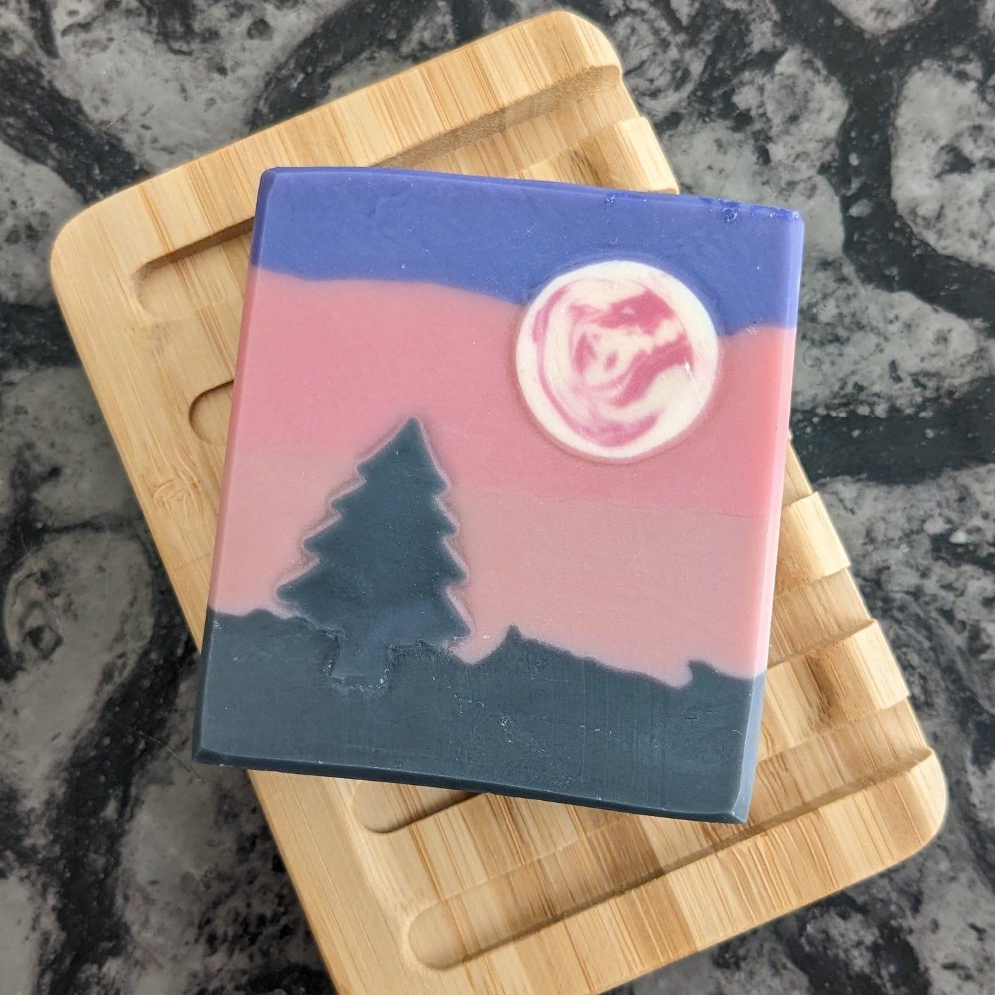 Pink and purple soap with pink moon and black tree