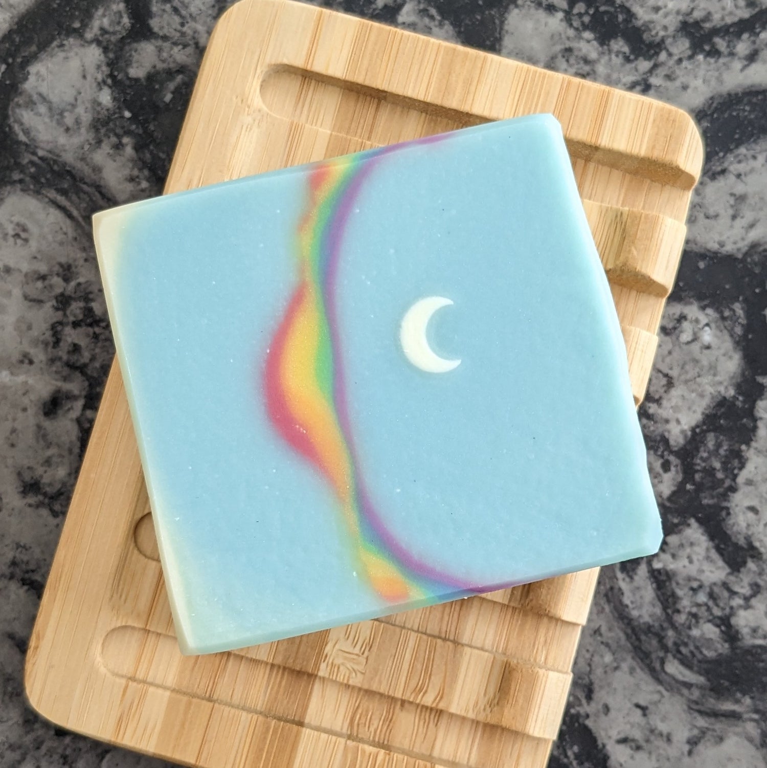 Soap with rainbow and moon on soap dish